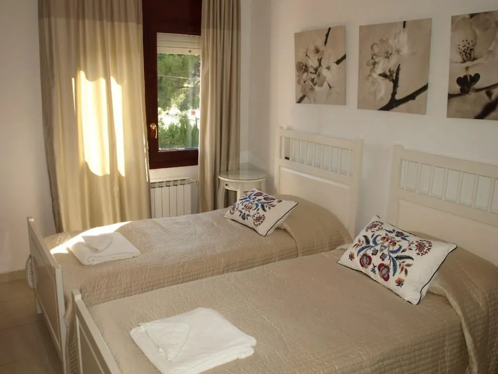 Villa Beach Haven: Spacious 8-Bedroom Retreat with Jacuzzi and Dual Kitchens Les Tres Cales Spain