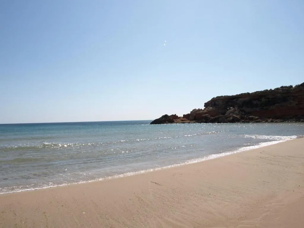 Villa Beach Haven: Spacious 8-Bedroom Retreat with Jacuzzi and Dual Kitchens Les Tres Cales Spain
