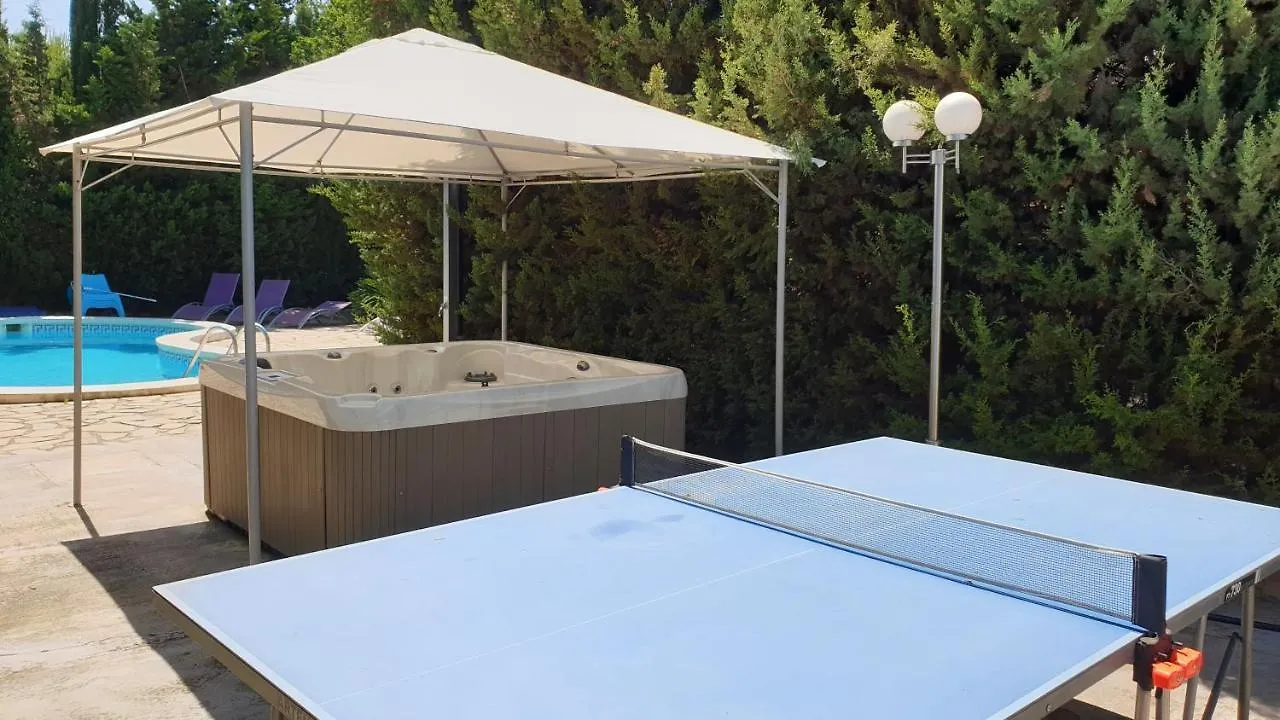 Beach Haven: Spacious 8-Bedroom Retreat with Jacuzzi and Dual Kitchens Les Tres Cales Villa